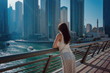 © Seleznov_Molchanova - Happy beautiful tourist woman in Dubai marina