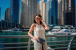 © Seleznov_Molchanova - Dubai travel tourist woman on vacation walking
