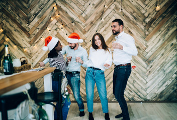 Wall Mural - Lovely friends dancing on Christmas party