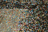 Fototapeta Tęcza - Colorful confetti on the floor