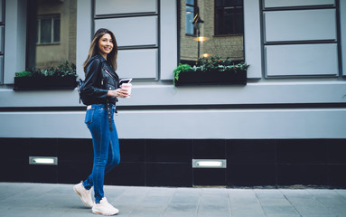 Beautiful Asian lady walking around city and smiling