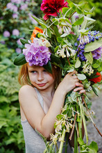 Girl Holding Bouquet Of Flowers