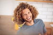 © Westend61 - Portrait of happy young man at home