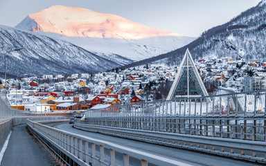 Wall Mural - Panoramic view of city of Tromso in winter at sunrise, North Norway. View from the bridge. Travel Norway.