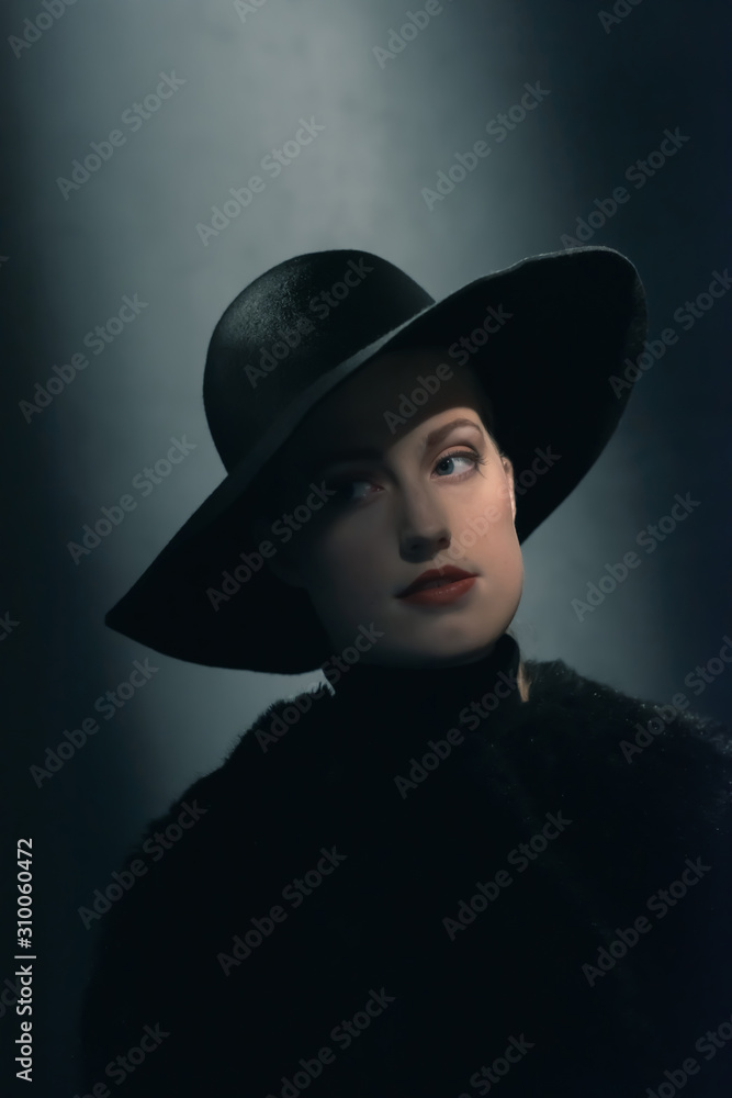 Retro 1940s woman in black hat. - obrazy, fototapety, plakaty 