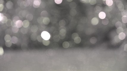 Christmas background with silver bokeh lights