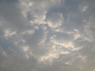 blue sky with white fluffy clouds for background 