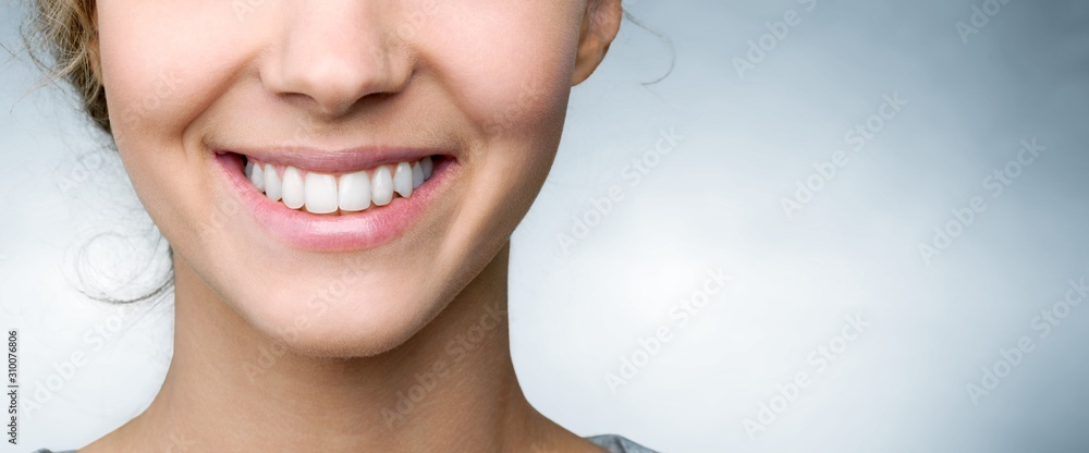 Beautiful smile of young woman with healthy white teeth - obrazy, fototapety, plakaty 