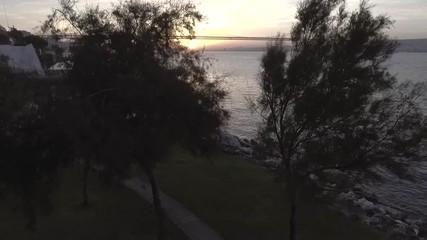Wall Mural - Aerial view suspension Bridge 25 De Abril Tagus River In Lisbon At sunset