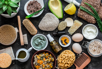Wall Mural - face, body skin care ingredients - cosmetic clay, brushes, soap, coffee scrub, avocado, lemon, aloe,