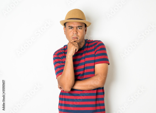 Asian Men Around The Age Of 27 35 Are Thinking And Making Faces Confused Not Understanding Wondering With Something This Photo Was Taken In The Studio With A White Background Buy This