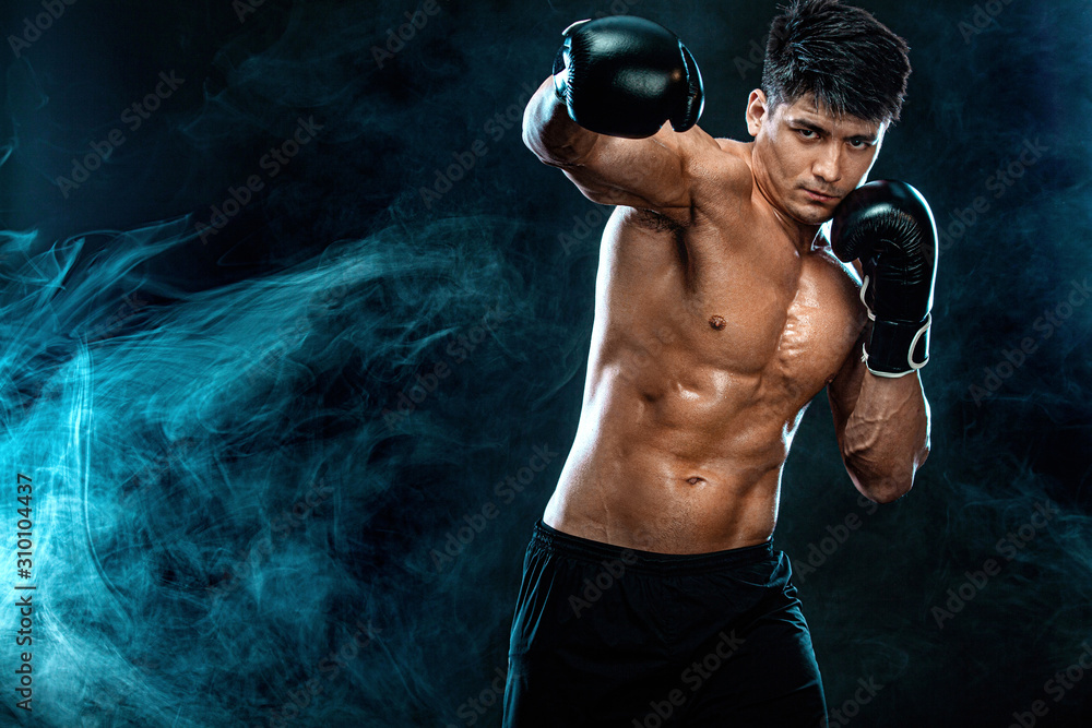 Fitness and boxing concept. Boxer, man fighting or posing in gloves on ...