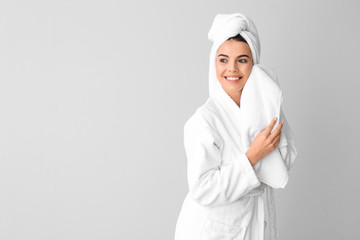 Poster - Beautiful young woman after shower on grey background