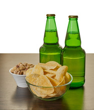  Beer In Bottles With Chips And Pistachios