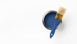 © juliasudnitskaya - Can of Classic blue paint and brush on white background. Trendy color concept. Top view.