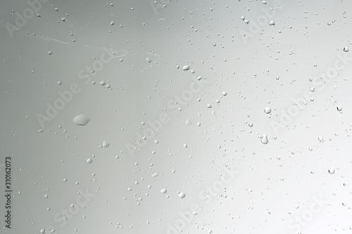 Fotografía wet glass background condensate / abstract rain, drops texture on transparent gl