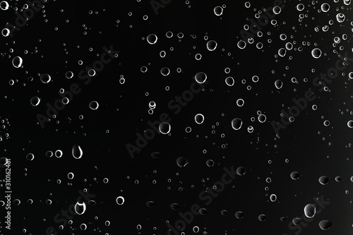 Cuadros en Lienzo black wet background / raindrops for overlaying on window, concept of autumn wea