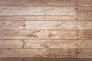 Wall Mural - The front of the village house is covered with old brown boards.Texture or background