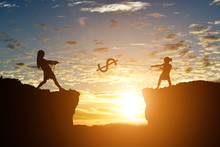 Silhouette Of Girl Pull The Rope A Dollar Coin On Cliff At Sunset Background. Tug Of War Money Hunt Concept.