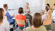 © JackF - Female teacher lecturing to students
