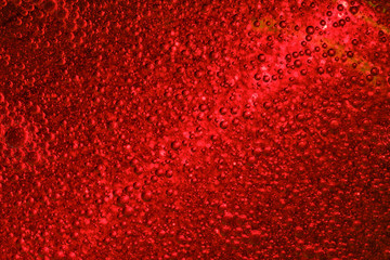 Wall Mural - Light beam rays through three dimensional red fluid with flaying transparent bubbles.