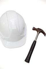 Hammer and hard against white background