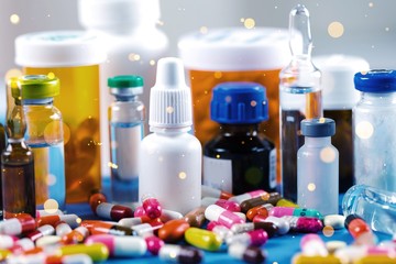 Canvas Print - Colorful pills and tablets with bottles on background