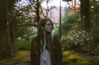 © Underwater girls - Beautiful girl in a mysterious forest as in a fairy tale. The mystical atmosphere of the forest. Old trees. Japanese garden. Atmospheric forest with green moss on the ground and moss on the branches