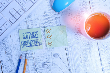 conceptual hand writing showing software engineering. concept meaning apply engineering to the devel