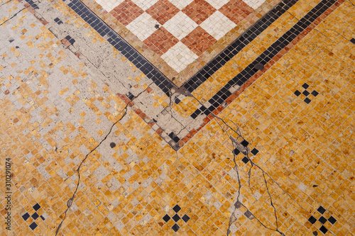 Detail Of A Vintage Old Style And Worn Mosaic Tiles And Floor