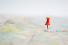 Selective Focus Of  Red Pin On Map Background