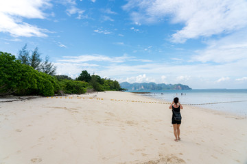 young cute hipster girl travelling at beautiful blue sky paradise tropical  coast beach PP Island Krabi Phuket Thailand guiding idea for long weekend  female relax rest woman women planning life