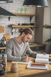 © zinkevych - Young handsome man studying languages at home