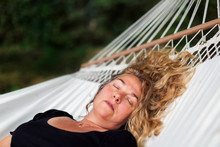 Woman Sleeping On Hammock
