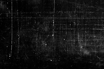 Wall Mural - grunge background with scratches on a black