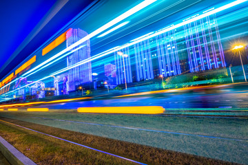 the traffic light trails of city.