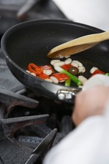 Canvas Print - Midsection Of Chef Cooking Food