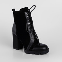 Black Womens Leather Ankle Boots Demi Season With Lacing And High Thick Heels. Studio Photo For The Catalog