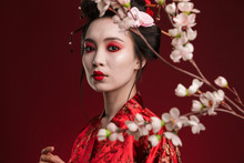 Image Of Geisha Woman In Traditional Japanese Kimono With Sakura Tree