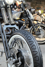 Front Fork Of Classic Motorcycle With Whitewall Tire