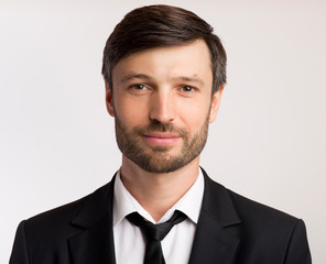 Handsome Mature Man Looking At Camera Posing, Studio Shot