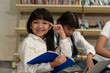 © montira - Education image,asian children happy learning in library at school.