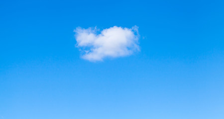Wall Mural - small white cloud in clear blue sky at daytime, natural background