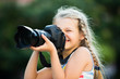 © JackF - little girl with camera outdoors.