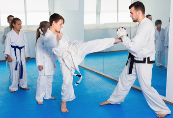 Wall Mural - Boys trying in sparring to use new technique