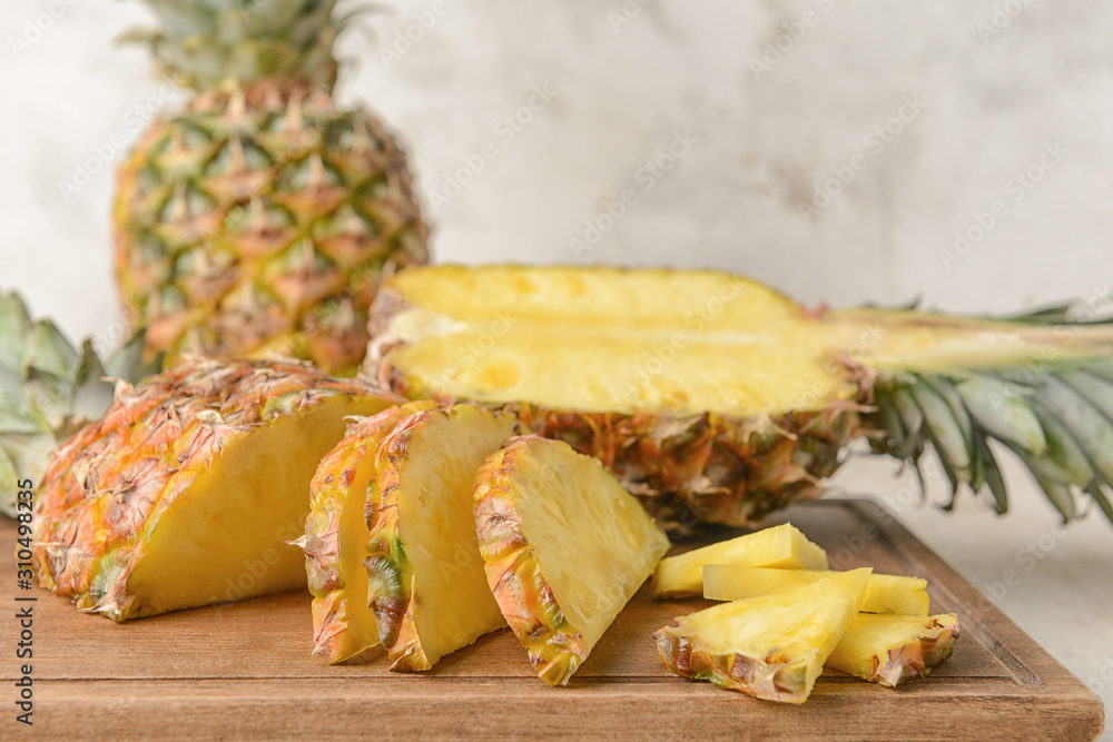 Fresh ripe cut pineapple on table