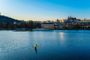 Wall Mural - Prague, Czech Republic - November, 19, 2019: Prague landscape with view of Vltava river and St. Vitus Cathedral