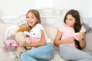 thats not fair. small children quarrel over toys. quarrel and toy fighting. sibling rivalry. family 