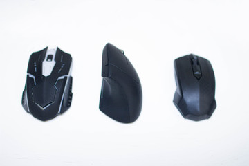 different types of computer mice. Vertical, gaming and office mouse.