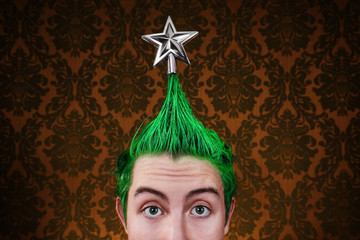 Teenage boy with Christmas tree shaped green hair